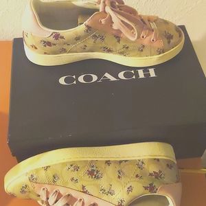 Coach shoes ;size:8w pinkshoe laces,tan,with white around bottom of sole.